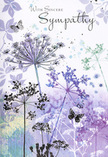 The design of this sympathy card reads like a soft-spoken verse painted in watercolour, reminiscent of a calm evening sky over Shepperton as the light begins to fade. Along the lower edge, fine, wiry stems rise in an elegant cluster, each carrying a lace-like umbel of tiny blooms. These floral silhouettes are rendered in a soothing palette of lavender, indigo, and soft blue, with hints of muted green that suggest slender leaves and wisps of meadow grass. The petals and seed heads are not solid blocks of colour but delicate, semi-transparent touches, letting the underlying washes show through and giving the sense that the flowers could sway at the slightest breath of air. Behind them, the background is a dreamy blend of cool hues, merging in gentle gradients like distant fields or softly shifting clouds. Here and there, pale impressions of additional foliage drift across the scene, adding depth without distraction. Nestled among the stems, a few butterflies float with wings barely defined, their presence subtle yet comforting, a quiet nod to transformation and enduring spirit. The entire composition feels cool but kind, like standing near the Thames with a light breeze on your face-calming, reflective, and unforced. It conveys the same tenderness a local Shepperton florist might show when helping someone choose a condolence gesture: thoughtful, restrained, yet full of feeling. Every line and shade seems to say, wordlessly, that sympathy can be expressed with gentle beauty and respect for quiet grief.